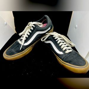 Black vans with gum sole, men size 10. Barely worn.